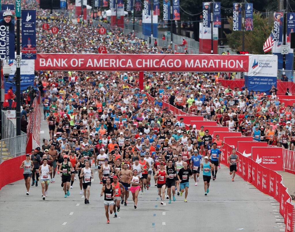 Chicago, Illinois, USA. 10th Oct, 2021. The 43rd Bank of America Chicago Marathon kicks off as thousands of runners northbound on Columbus Drive on an usually warm day with highs expected to reach 82 degrees, Sunday October 10, 2021. An estimated 35,000 p